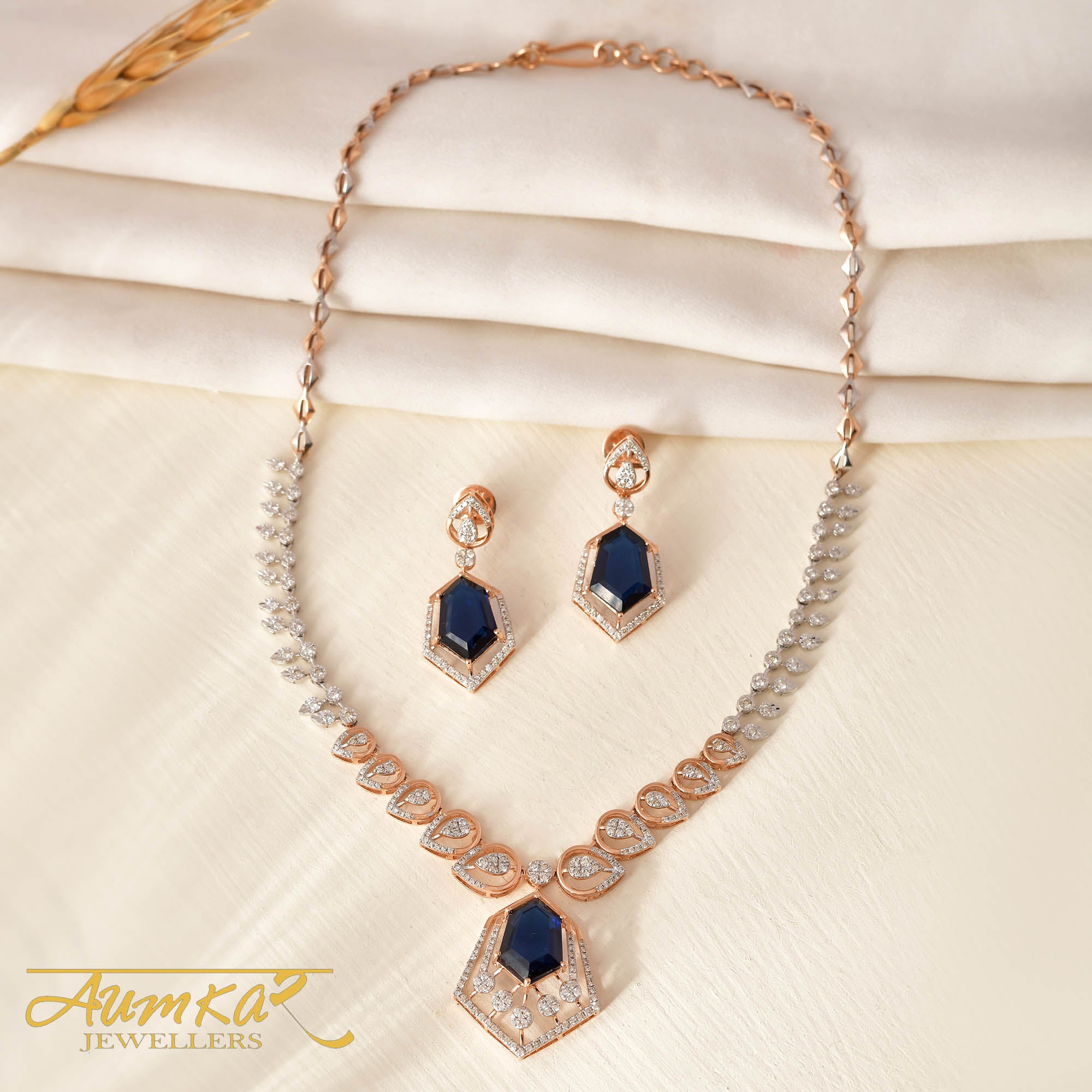 Sapphire Radiance: Diamond-Shaped Blue Stone Necklace With Round Diamond Accents