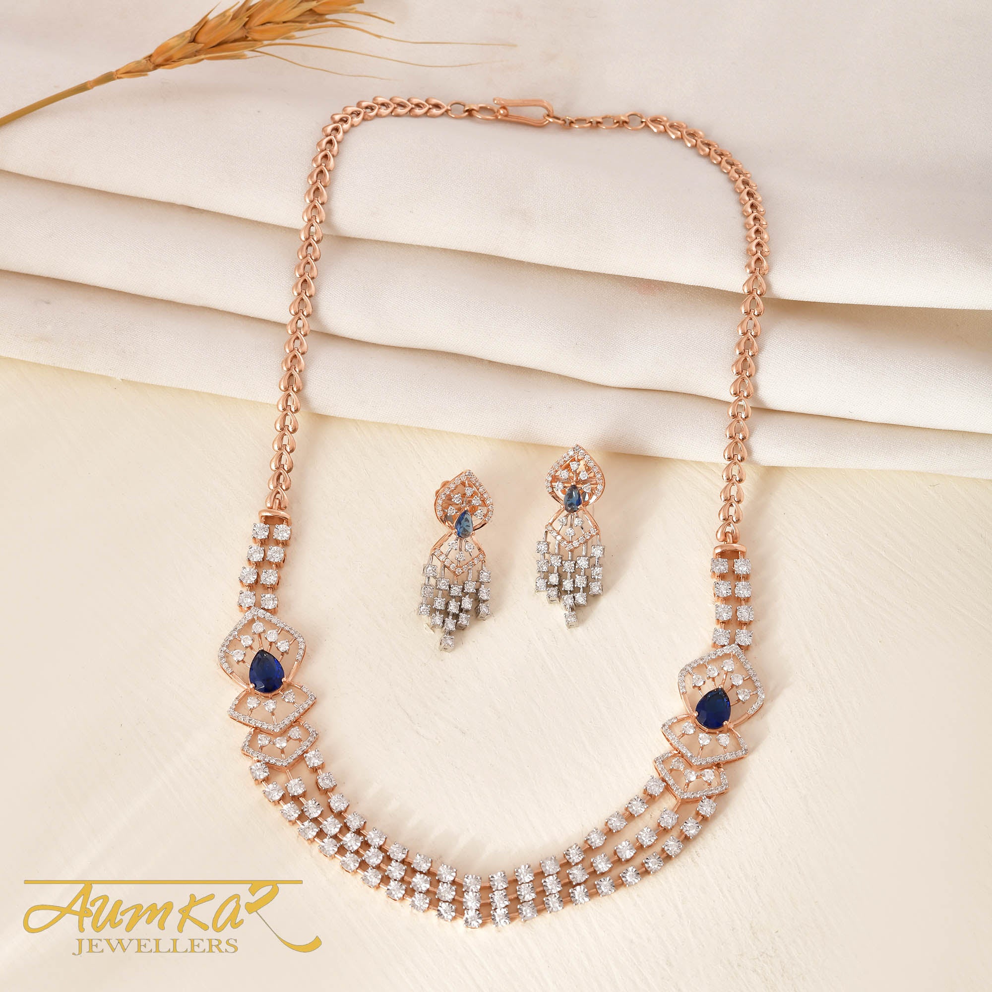 Triple Elegance: Blue Stone Necklace With Three Strands And Miracle-Set Diamonds